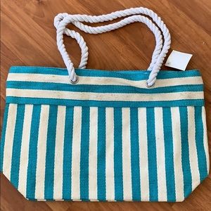 Blue and white striped beach bag
